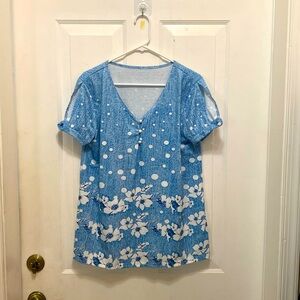 Beautiful blue and white floral blouse.